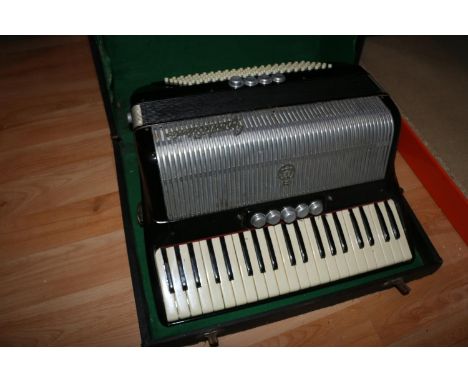 Frontalini cased Accordion. 