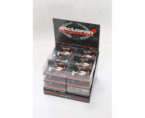 Pauls Model Art Micro Champs shopkeepers display stand containing twenty-four 1:64 scale McLaren Collection Ayrton Senna McLa