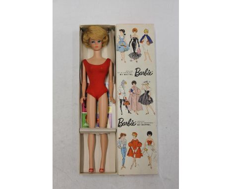 1960s Mattel Inc Toymakers Barbie doll no: 850 'Platinum Bubble Cut' Teen Age Fashion Model with Pedestal, in red dress and r