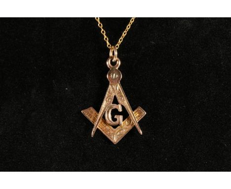 9ct gold Masonic pendant in the form of a crossed compass and square with 'G' in the centre, by William Adams Ltd, Birmingham
