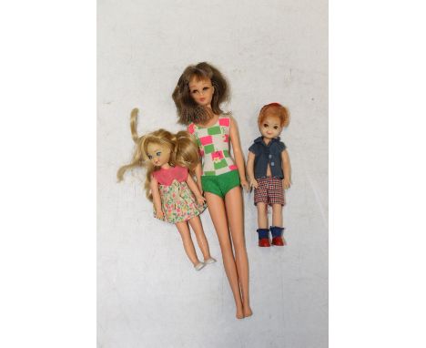 1960s Mattel Inc Toymakers Barbie doll Barbie's Cousin Franchie (1965), white skin tone, brunette wearing daisy pattern pink 