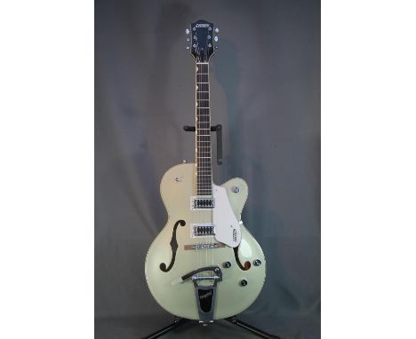 Gretsch Electromatic six string electric guitar with Bigsby bridge in soft case, model number G5426T, 105cm tall. 