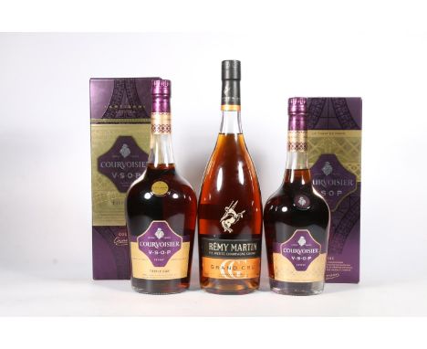 Three bottles of cognac brandy to include REMY MARTIN V S Petite Champagne Cognac Grand Cru 1litre 40% abv., COURVOISIER VSOP