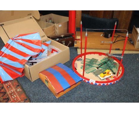 Big Top Circus tent model on bespoke made table having various accompanying models to include lions, gymnasts etc. 