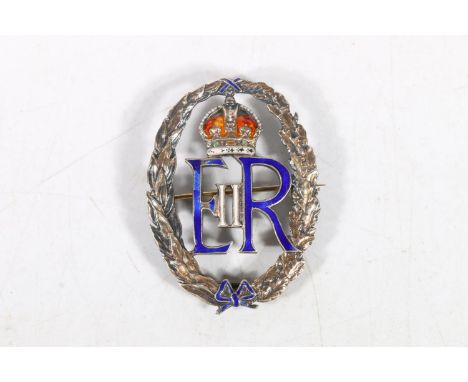 White metal and enamel ERII Honorary Chaplain to the Queen badge of office. There is no number impressed on the reverse of th