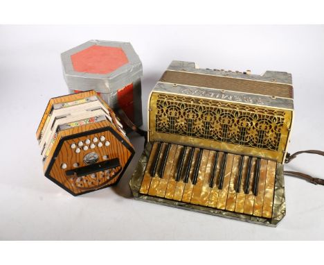 Boxed Concertina made in German Democratic Republic and a Fremielio accordion (2). 