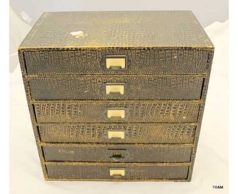 A vintage East-Light nest of six drawers 40cms wide by 39cms high and 24cms deep