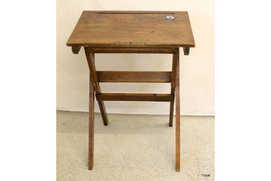 A Vintage Folding School Desk With Recessed Inkwell