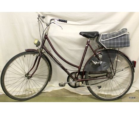 A Ladies Raleigh Camero push Bike with 3 speeds, basket and light etc