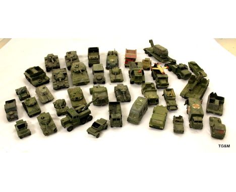A collection of play worn Army Dinky and Corgi