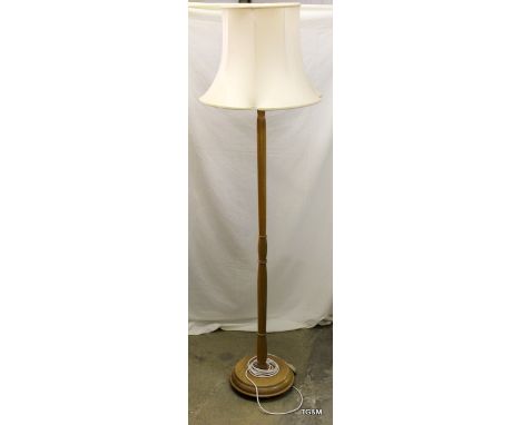 A mahogany standard lamp and shade 158cm high