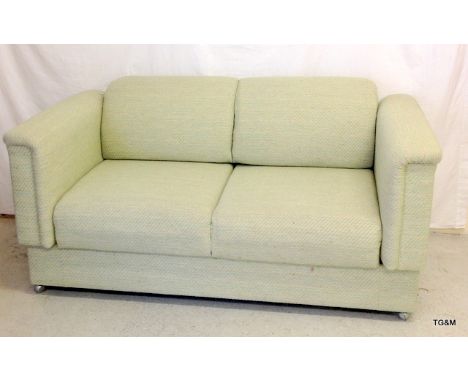 An upholstered sofa bed/2 seat settee 