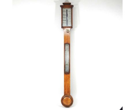 A 19th century light oak cased stick barometer, the ivory dial signed Elliott Bros., 56 The Strand, London, 96cm high. Note: 