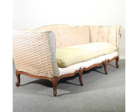 An early 20th century French upholstered canape sofa, with a buttoned back, on carved cabriole legs224w x 80d x 85h cm