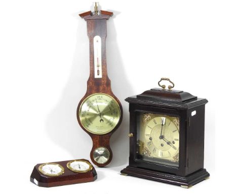 A modern bracket clock, 32cm high, together with a barometer and a desk set (3)