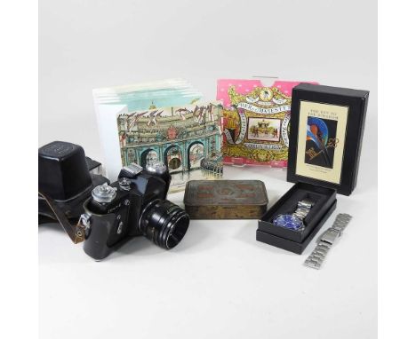 A 1918 Christmas tin, together with a collection of items to include playing cards, watch parts and a cameraThe tin in this l