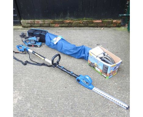 An electric hedge trimmer, together with an electric sander, a folding chair and a Wagner electric paint sprayer (4)