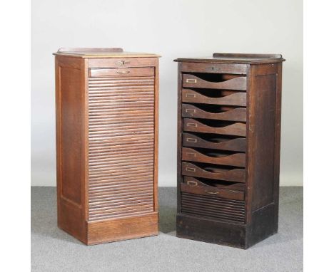 An early 20th century oak tambour fronted filing cabinet, 49 x 42 x together with another similar (2)49w x 42d x 104h cmThe l