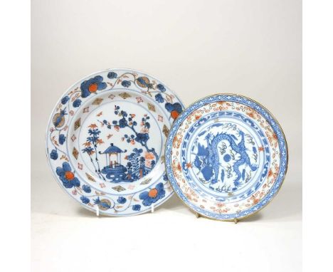 An 19th century Imari porcelain plate, decorated with a dragon, 21cm diameter, together with another similar modern plate (2)