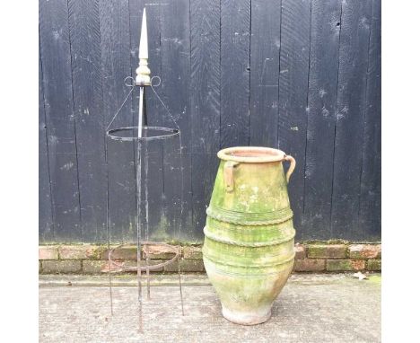 A metal garden obelisk, 140cm high, together with a terracotta garden urn (2)