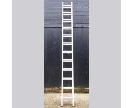 An aluminium extending ladder in two sections, each 330cm