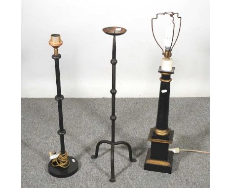 A gilt and black painted table lamp, together with two others (3)