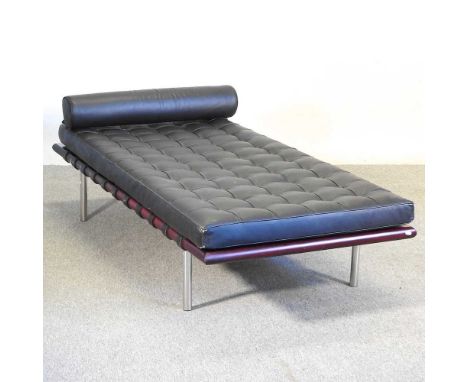 After Mies Van Der Rohe, a Barcelona day bed, with a black buttoned seat and cushion, on metal legsOverall complete and usabl