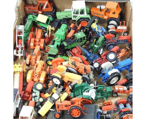 A large collection of model toy tractors, to include Dinky Massey Harris and Leyland, Ertl and Universal Hobbies