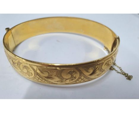 Antique 9ct gold core gilt bangle with good quality catch and finely etched in its original box 
