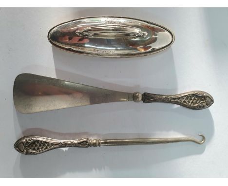 Edwardian ladies silver topped nail file together with a silver handled shoe-horn and a silver handled button hook(3) 