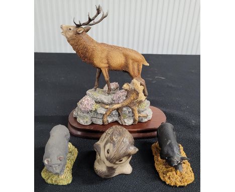 Four Poole and Royal Doulton animal figures (4) 