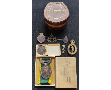 Collection of various military medals and badges including a King George VI "Territorial" medal stamped W. Wilkinson (Qty) 