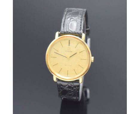 OMEGA De Ville Herrenarmbanduhr in GG 750/000,  Schweiz um 1969, Handaufzug, Ref. 111 067, 2-teil. Geh. angel., Glasrand aufg