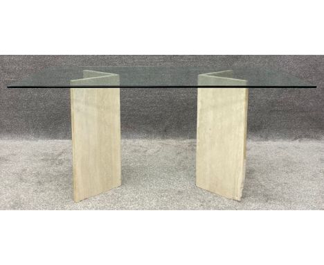 A 1970's vintage dining table with bevelled plate glass top on Travertine marble pedestal supports. H.74 W.161 D.90cm 