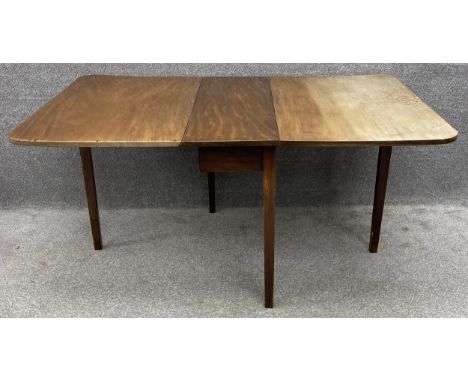A 19th century mahogany drop flap dining table with gate-leg action. H.72 W.33 (156 extended) D.107cm. (Sunlight affected to 