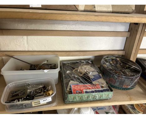Two boxes of various assorted buttons plus further tools, buckles etc