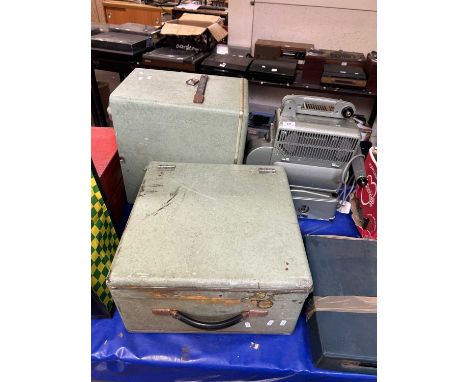 A vintage Siemens projector together with accompanying speaker and case