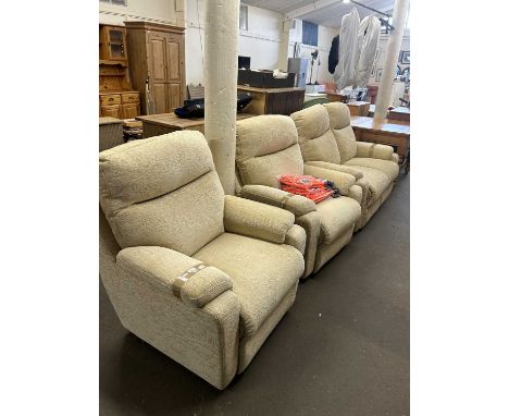 Cream three piece suite comprising of a two seater sofa and two armchairs