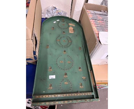 A vintage bagatelle board