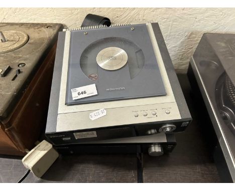 Two Philips Microsystem Compact Disc Player and accompanying amplifier together with a pair of speakers