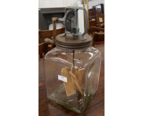 A glass cream making churn 