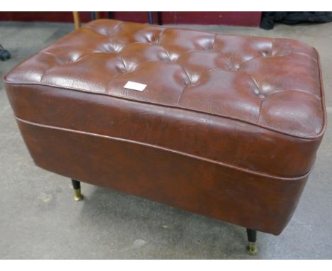 A brown vinyl pouffe 