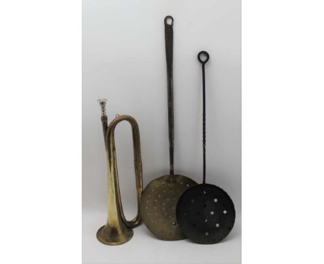 A BRASS BUGLE together with two skimmers or roasters 