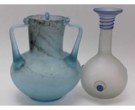 TWO GLASS VASES OF CLASSICAL FORM, one in pale blue having three handles of Tyg form 24cm high, the other of frosted bottle n