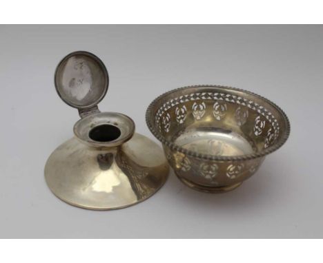 A SILVER CAPSTAN DESIGN INKWELL, hinged cover, base 11.5cm dia, together with a Birks sterling silver non-bon bowl with pierc