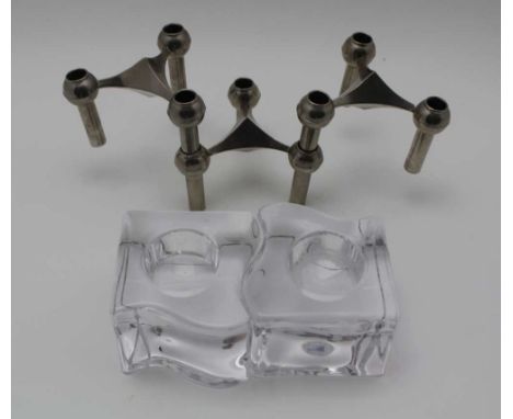 A PAIR OF SWEDISH ORREFORS GLASS NIGHT LIGHT HOLDERS, 6cm high, together with three interlocking German metal candle holders 