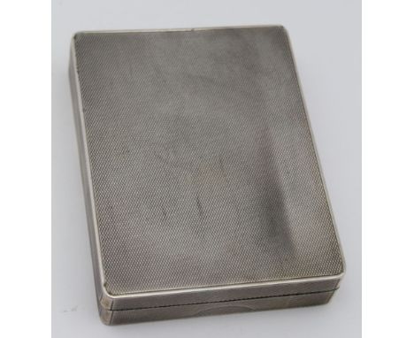 A 'DUNHILL' OF LONDON SILVER CIGARETTE BOX, press button clasp, hinged lid, outside engine turned decoration, interior gilded