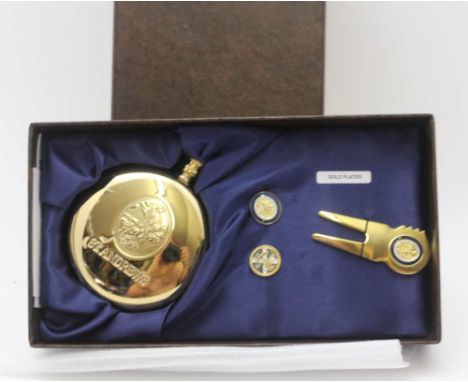 A 'ST ANDREWS' GOLF COURSE PRESENTATION GOLD PLATED SET, comprising a hip flask and a divot repairer, in original box 