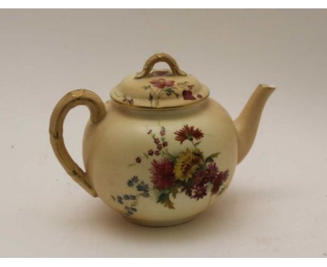 A ROYAL WORCESTER BLUSH IVORY GROUND PORCELAIN TEAPOT, hand painted floral decoration, gilded highlights, with cover date cod