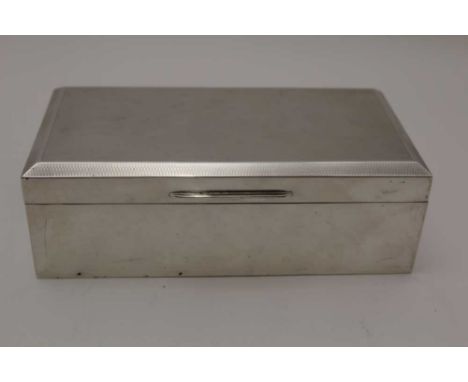 D.BROS, A SILVER CIGARETTE BOX, engine turned hinged lid, cedar wood lined, 16.5cm x 8.5cm x 5cm, Birmingham 1955 